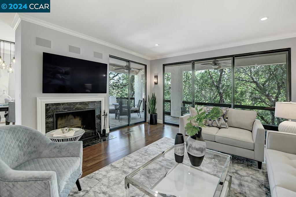 Captivating Villa Encanto Model located in a very private picturesque natural setting beneath the filtered canopy of beautiful oak trees. Rarely do you find a home that has been so beautifully remodeled with such distinctive architecture and design using only the highest quality finishes. The list of quality details is endless.