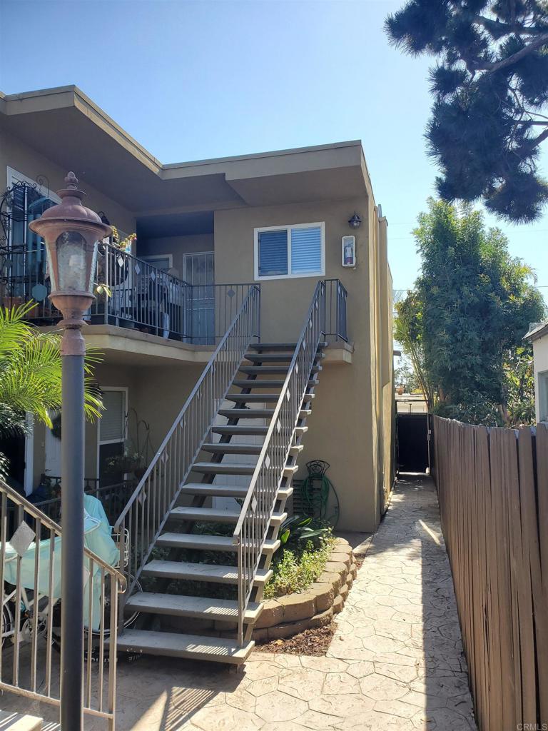 Fabulous location just 2 blocks to the beach! Walkable to all the restaurants, bars and activities that PB has to offer. Tucked away in a quiet complex, this 2nd floor corner unit is private, has no one below you and just one shared wall. Excellent natural light and completely turnkey with bamboo floors, granite counters, SS appliances (new refrigerator), tiled shower w/jacuzzi tub, etc. Just move in and enjoy the coastal life! The complex has secure gated entry and the unit comes with one secure garage parking space and storage for beach toys, etc. Super low HOA. Don't miss out - units in this complex rarely go on market!