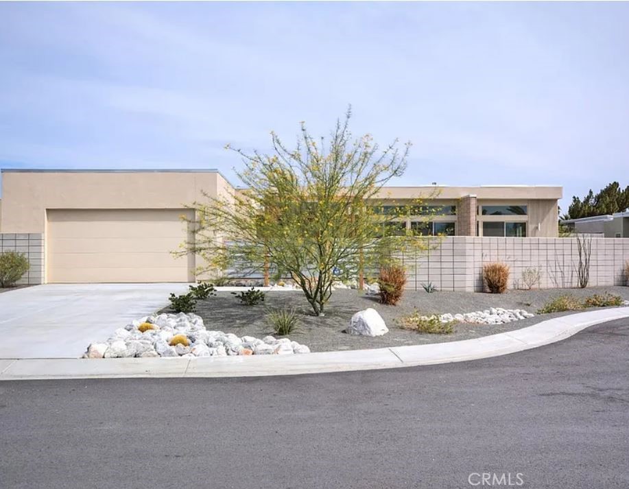 Nestled in Palm Springs’ scenic Murano development, this modern home, built in 2014, blends mid-century architectural charm with today’s energy-efficient amenities.
Set on a generous 0.34-acre lot (over 14,800 sq ft), the property offers private outdoor living with pool, spa, and a built-in fire pit, all framed by sweeping views of Mount San Jacinto.
Inside, you’ll find a light-filled open floor plan with clean lines, high ceilings, and polished concrete floors that give it a sleek and spacious feel.
The home features 3 bedrooms and 3 bathrooms, with the primary suite enjoying easy access and views of the pool/spa area.
Additional perks include attached two-car garage, solar panels (owned), central heating & cooling systems, and no HOA.
