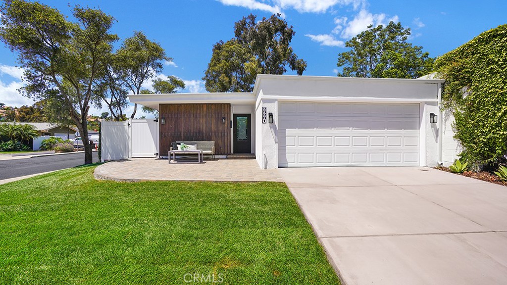 Completely Renovated Single-Level Home in Crown Valley Highlands
Welcome to 23231 Cheswald Dr, a beautifully reimagined single-story home nestled on a prime corner lot in the desirable Crown Valley Highlands community of Laguna Niguel. Featuring 3 bedrooms and 2 bathrooms, this home has undergone a comprehensive, high-end remodel that delivers the feel of new construction in an established neighborhood setting.
Every major system has been upgraded—new drywall, insulation, plumbing, a 200-amp electrical panel, recessed lighting, and nearly all-new wiring. The home also features a brand-new AC system, dual-pane windows, modern doors, EV charging capability, and an epoxy-coated garage floor. The open-concept kitchen has been completely redesigned with new cabinetry, appliances, and sleek ceramic tile flooring that continues into the living areas, while the bedrooms are finished with warm, wood-look vinyl plank flooring. The spacious primary suite opens to a private, fully tiled patio—your own serene retreat.
Outside, you'll find a new concrete driveway and walkways, fresh landscaping, new lawn and irrigation, mature trees, and full fencing for privacy. A professionally designed Landscape Master Plan has already been approved by the HOA, and includes PDFs of detailed renderings, plant palettes, and descriptions of all major design elements—ready for seamless implementation.
Ideally located, this home is just 10 minutes from Salt Creek Beach, with easy access to Laguna Beach, Dana Point Harbor, and world-class resorts including the Ritz-Carlton, Waldorf Astoria Monarch Beach, and Montage Laguna Beach. Enjoy the best of coastal living—from sand and surf to fine dining and resort-style entertainment—all within a short drive.
Community amenities include a resort-style pool, clubhouse, pickleball and basketball courts, playgrounds, parks, and scenic trails. With low HOA fees, no Mello-Roos, and an unbeatable location, this turn-key home offers exceptional style, comfort, and coastal convenience.