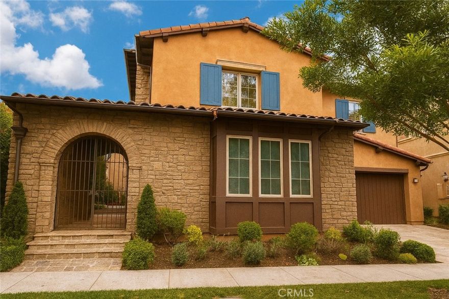Located in the picturesque Orchard Hills community of Irvine, this impressive Tuscan-style residence showcases an elegant stone exterior and grand arched entryway. A sweeping staircase and exquisite limestone flooring create a spacious and sophisticated atmosphere.The chef-inspired kitchen is equipped with top-of-the-line stainless steel appliances, surrounded by Lapidus natural stone countertops and a center island, complemented by a herringbone tile backsplash. Solid maple cabinetry with a rustic glazed finish adds refined detail throughout.A formal dining room and en-suite bedrooms provide comfortable and private living spaces for family and guests. Outdoor living is equally exceptional, featuring a stunning courtyard, loggia, and patio that together create a perfect private retreat.The community offers exceptional amenities and is conveniently located near parks, trails, shopping, and highly acclaimed schools.