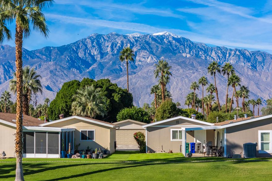 Fabulous Western Mountain View from your back patio.  Beautiful 55+ Gated Community with panoramic views of surrounding mountains, Super Nice floor plan, Light & bright.  Located in the newest section at Desert Sands Mobile Home Park. Triple wide with 2 car garage. Spacious living room/den, family room. The dining room area & Kitchen have laminate flooring, New Carpet in bedrooms, Freshly Painted. New Ceiling Fans thru-out. Light & bright with lots of windows... The master bedroom looks straight out to the gorgeous snowcapped mountains and greenbelt. Lush large side yard with lots of privacy your own little paradise in your backyard. French doors that lead to a covered patio back patio area or go thru garage, it's perfect for entertaining. Master bath having dual sinks and an oversized shower. Great home at an affordable price. Desert Sands is a gated senior community, with pool, spa, sauna, clubhouse, fitness room, pool tables, card room, meticulous grounds and onsite management. Conveniently located only minutes from nearby shopping, dining, airport, casinos and more. Great community. Easy to show on short notice. Agents review private remarks.