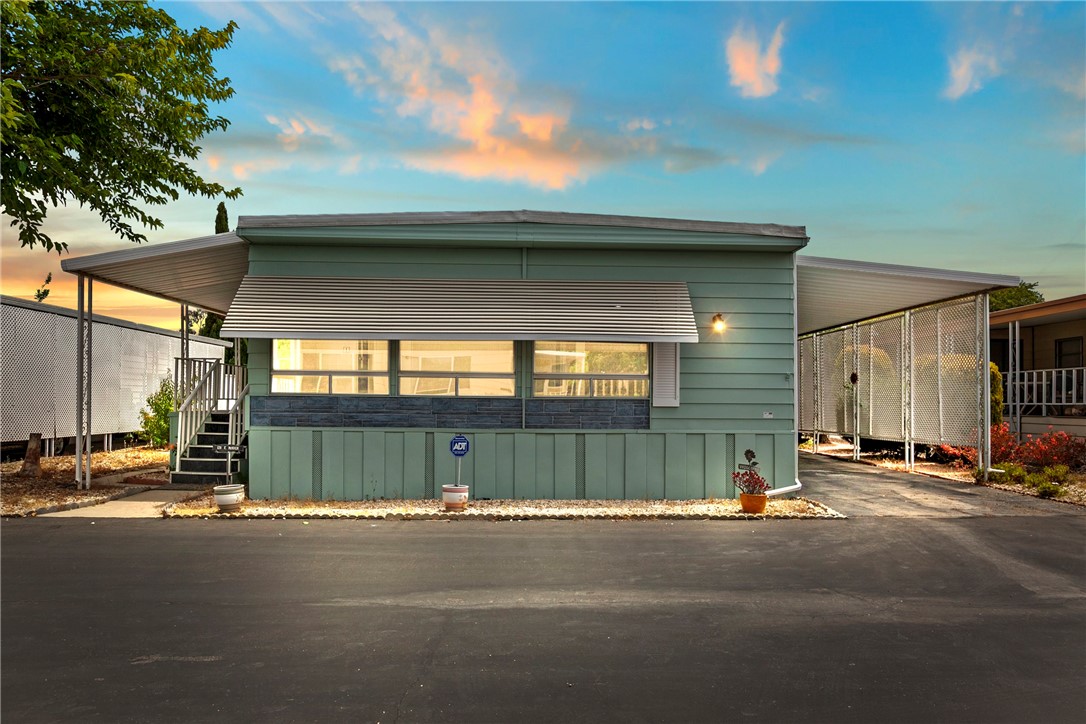 A Heartfelt Welcome Home — Beautifully Remodeled & Truly Move-In Ready
Step into a place where comfort meets care in this beautifully updated 1971 mobile home in the desirable Del Cielo Mobile Home Estates. Offering 1,440 square feet of thoughtfully remodeled living space, this 2-bedroom, 2-bathroom gem includes a bonus room and dedicated laundry area.
From the moment you enter, you’ll feel the warmth of a home that’s been truly loved. Brand new rigid core vinyl plank flooring flows seamlessly throughout, paired with fresh interior and exterior paint that gives the space a clean, modern feel. Every detail has been considered, from updated faucets and doorknobs to new baseboards, trim, and even a freshly sealed and coated roof.
The heart of the home—the dining area—effortlessly opens to the kitchen and living spaces, creating a welcoming atmosphere for meals at the breakfast bar, conversation, and connection. Both bedrooms offer updated doors, and the primary bath features a luxurious gold-trimmed mirror, spacious vanity, and a soaking tub to unwind after a long day. New commodes have been installed.
Step outside to find two freshly painted storage sheds and charming front railings with a large front porch to enjoy those nice sunny days and evenings--perfect for relaxing, hosting, or simply enjoying the day-to-day.
Whether you envision a blossoming garden or a peaceful, low-maintenance yard, the outdoor space is ready for your personal touch.
More than just a home, this property carries the heartfelt wish of its previous owner: to pass on a space that’s not only move-in ready but also low-maintenance and lovingly prepared for the next chapter.
Pride of ownership is evident in every corner—come see how this special home can be the beginning of your next beautiful story. Pool and Clubhouse amenities are included in the space rent.