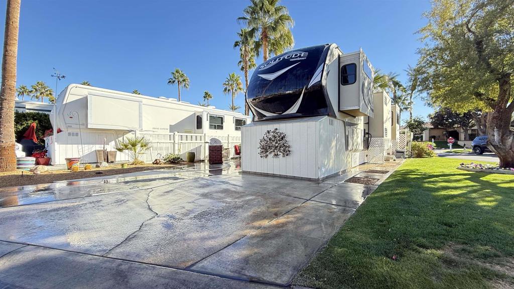Lot 713, Enjoy views of the majestic mountain with this east to west orientation. Located in a vibrant, fun neighborhood, this lot has plenty of sunshine, and offers a short walk to the main El Saguaro clubhouse and nightly activities. The 2017 Solitude 5th wheel makes a nice home on this spacious corner lot. Outdoor Resort Palm Springs (ORPS) is a Guard Gated 5-Star RV Resort Community offering an active and luxurious lifestyle featuring golf (27 holes), tennis, pickleball, swimming and more! Two clubhouses, fitness center, beauty solan, La Roma Restaurant on campus, dog park and more!