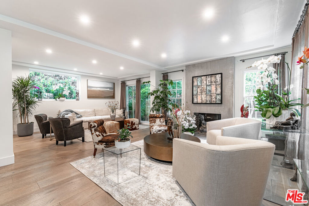 Welcome to your dream lease opportunity in Beverly Hills, a meticulously remodeled haven that perfectly combines luxury with tranquility. This stunning residence features three spacious bedrooms and three and a half bathrooms, offering you and your loved one's ample space to thrive. The primary suite includes a bathroom with a shower & separate tub, walk-in closet, and balcony. Chefs' kitchen with Wolf appliances & wine refrigerator. Inside, a cozy fireplace graces the living area, creating an inviting atmosphere for relaxation and gatherings. Whether you're looking to work from home or indulge in a creative endeavor, the dedicated office space adjacent to the 2nd ensuite bedroom provides the ideal setting. But that's not all step outside into your private yard, where you can bask in the sunlight, host delightful outdoor gatherings, and savor delicious barbecues. Side-by-side laundry inside. The garage includes built-in cabinets and an extra refrigerator. This quiet oasis invites you to experience the best of both worlds, a refined, modern interior, and yard for your enjoyment. Minutes away from the iconic Beverly Hills Hotel, Sunset, and fine dining and shopping in the center of Beverly Hills.