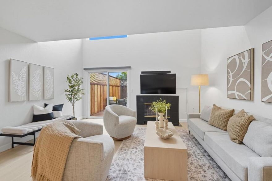 Enter this beautifully renovated home, ideally located in the heart of Silicon Valley. Featuring brand-new luxury vinyl plank flooring and an open-concept layout, this 1,345 sq ft residence offers comfortable living that truly feels like a single-family home.At the heart of the home is a chef-inspired kitchen, thoughtfully redesigned with quartz countertops, stainless-steel appliances, backsplash, and an induction cooktop. The inviting living room features a cozy fireplace, recessed lighting, and automated curtains. The bathrooms are completely updated with vanities, LED mirrors, modern light fixtures, and a spacious walk-in shower. Upstairs, two generously sized bedrooms that provide comfortable retreats.  Outside, enjoy a low-maintenance expansive backyard that is perfect for relaxing. The finished garage includes an electric vehicle charger and is complemented by an additional parking space. Just minutes from Campbell Farmers Market, Los Gatos Creek Trail, and top-rated schools, including Leigh High School. Enjoy easy access to shopping and dining at The Pruneyard, Santana Row, Valley Fair, Hwy 17, Hwy 280, San Tomas Expressway, and major tech employers. This is a rare chance to own a fully upgraded home in one of Silicon Valley's most sought-after neighborhoods.
