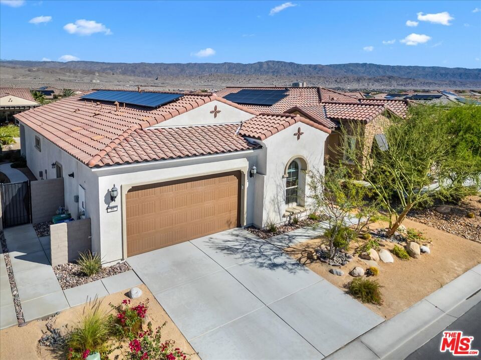 Location, location, location, this perfectly designed Getaway model in Del Webb is on the market.  Upon entering this home, you feel as though it is extended, the upgraded beautiful engineered wood flooring, gives the impression of length.  The kitchen, tile and backsplash are upgraded coffee glass.  The primary room feels very spacious and has a great view of the backyard, upgraded 'berber" carpet in both bedrooms.  The primary bath has custom designed barn doors.   Both restrooms have upgraded tile, and counter tops that matches, the kitchen, to complete the look. The laundry and 2 restrooms share the same look and upgraded tile floors. The house been wired for surround sound and audio, including the outdoor backyard.  Cabinet underlighting and additional canned lighting.  Peninsula has continued upgraded glass tile.  The backyard is very inviting, with an extended covered patio, enjoy the beautifully landscaped yard and enjoy specatular views of the mountains and walking paths.  Located in a prime location of the community, very close to the clubhouse.  Where there are many events for the members of Del Webb.  Looking to join a group or start one, this is the place, we have over 50, ranging from pickleball, tennis, golf, majong, poker, wine tasting, book clubs and the list goes on.  Come and check this great home out, and start enjoying the lifestlye that it offers you.