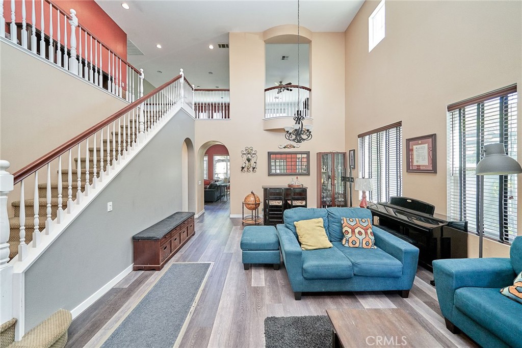 Corner Lot Gem with Paid solar! Don’t miss your chance to own this one-owner corner-lot home in the highly sought-after Wolf Creek Community, known for its low HOA fees and resort-style amenities.
This spacious residence features 5 bedrooms, 3 full bathrooms plus a ¾ bath, and a generous loft—perfect for a game room, home office, or additional living space. Soaring ceilings and expansive windows fill the formal living and family rooms with natural light, creating a bright and inviting atmosphere.
The open-concept kitchen boasts granite countertops, a large center island, and plenty of cabinet space. It flows seamlessly into the family room, complete with a cozy fireplace and built-in bar—ideal for entertaining guests.
Modern updates include newly installed wood laminate flooring on the main level and recessed lighting throughout. Two downstairs bedrooms share a convenient Jack-and-Jill bathroom.
Upstairs, you’ll find a spacious loft and two additional bedrooms with a shared bath featuring dual sinks and a separate shower area. The luxurious primary suite offers a private ensuite with dual vanities, a soaking tub, separate shower, and two walk-in closets.
Step outside to enjoy beautifully landscaped front and backyards with multiple inviting sitting areas—perfect for relaxing or hosting gatherings.
Wolf Creek residents enjoy access to top-tier amenities including a pool, spa, fitness center, park, and playground. The location is unbeatable—just 3 minutes from Pechanga Casino and 5 minutes from top-rated Great Oak High School, with fantastic dining, shopping, and entertainment nearby.
Plus, the home comes equipped with two solar energy systems that fully cover electricity needs, with potential for energy credit back. Even better—one system will be completely paid off at close of escrow, offering long-term savings and peace of mind.