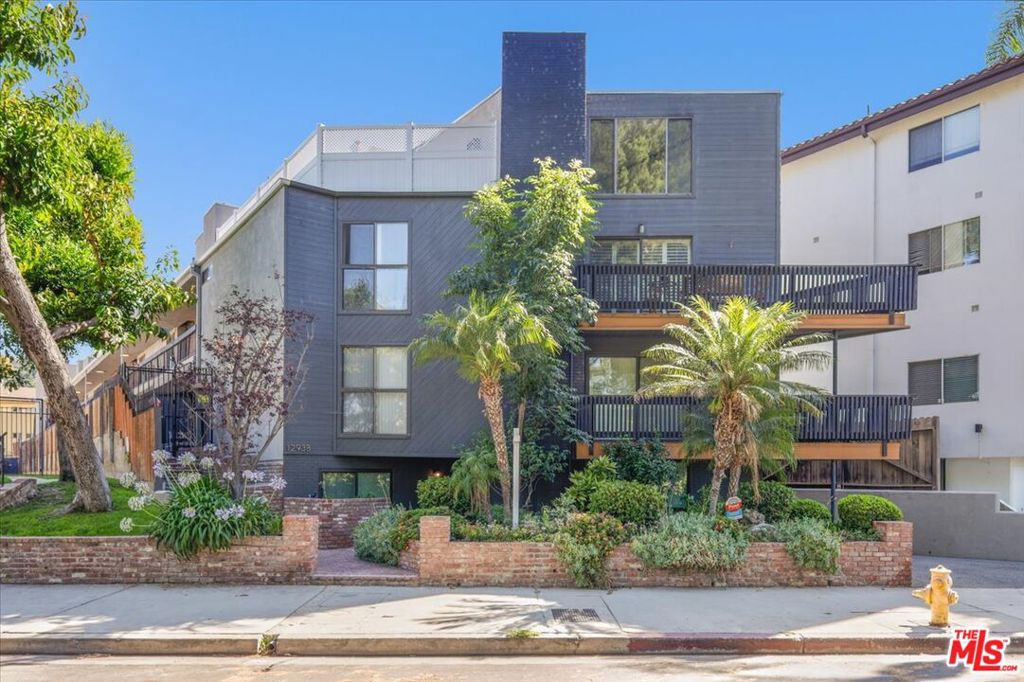 A Harmonious blend of Style and Comfort in this remodeled, Turnkey 1 bedroom plus Loft with a Private Rooftop Deck home in the heart of Studio City. Located on the Top Floor and in the rear portion of the building this perfectly situated Contemporary with Architectural design elements and European flair is truly a special place to spend time. The commanding space is graced with 17 ' high ceilings and oversized windows ushering in natural light creating an eclectic and energizing creative space while providing a serene respite from the burgeoning neighborhood surround. The main level consists of a comfortable living room, a dining area that plays to an expansive balcony, gorgeous remodeled gourmet kitchen, a designer done bathroom, and primary bedroom with walk-in closet. The upper level provides a loft space that can be used as a second bedroom/office/den/artist retreat and private rooftop deck for sunbathing, yoga, and private moments. The new windows & doors, newer HVAC system, and overall pristine conditions combine to provide the next owner a move in ready oasis. 2 car parking, additional assigned storage, washer dryer hookups in unit complete this showcase of a home: truly a special place to spend time. At your doorstep you will find Equinox, Erewhon, all the wonderful shops and restaurants of Sportsman Lodge and Ventura Blvd...Come and see this special offering.
