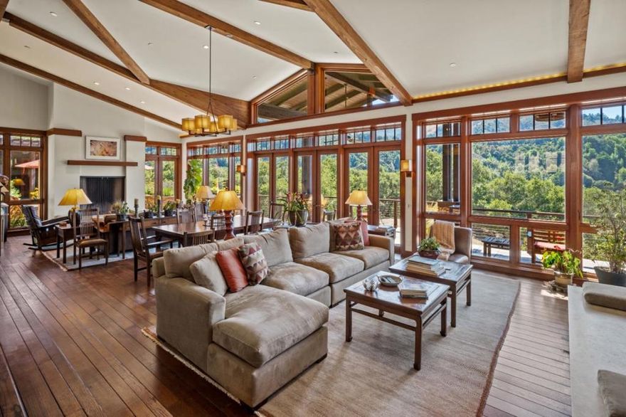 A Premier Setting at Santa Lucia Preserve. Set on one of the most desirable parcels along Rancho San Carlos Road just 3 miles from the Hacienda and 5 miles from the Gatehouse. 43 Rancho San Carlos Road offers a rare combination of privacy, natural beauty, and convenient access to both the vibrant Santa Lucia Preserve and the charm of Carmel-by-the-Sea. Designed by Hart Howerton Architects, the residence draws inspiration from Californias Arts and Crafts tradition and the timeless Prairie Farmhouse. The result is a home rich in craftsmanship and detail, yet light-filled and open to its surroundings. Inside, the homes heart features an open-concept living and dining area framed by expansive views of the coastal foothills. Two inviting sitting areas, each with a wood-burning fireplace, flank the dining space and open effortlessly to a spacious outdoor living terrace perfect for golden sunsets and star-filled nights. A gracious guest wing welcomes visitors at the eastern end of the home, while the private primary suite anchors the west, offering serene woodland views beneath a canopy of mature oaks. Quietly tucked into the landscape, a private study provides a retreat for reflection or creative pursuits, with a second study offering sweeping mountain vistas.