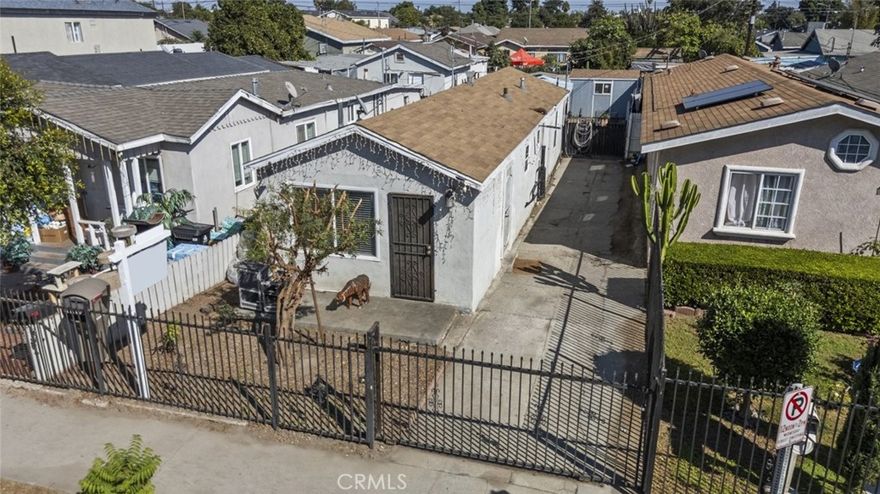 Welcome to this charming 3-bedroom, 1-bath home offering comfort, functionality, and room to grow in a centrally located pocket of Los Angeles, just minutes from major freeways and local amenities. This 700 sq ft residence features a bright living area, a full kitchen with ample cabinetry, and laminate flooring throughout. Each bedroom is filled with natural light, creating a warm and inviting atmosphere. Situated on a 3,253 sq ft lot, the property provides space for outdoor enjoyment, gardening, or entertaining—and offers excellent potential to add square footage, making it ideal for those looking to expand or invest. Move-in ready and well-located in the heart of Watts, this home represents a great value opportunity in one of Los Angeles’ most accessible neighborhoods.