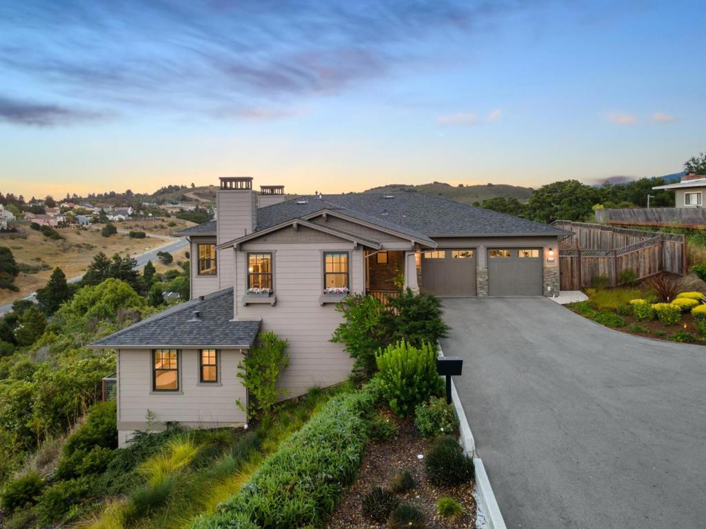 Discover the perfect blend of luxury, comfort, & California living at 2185 Cobblehill Place, nestled in the highly sought-after Highlands neighborhood of San Mateo. Situated on a sprawling 17,997 sq ft lot, this beautifully crafted home features 4 bedrooms, 3.5 bathrooms, & 3,390 sq ft of thoughtfully designed living space. Expansive picture windows in the light-filled living & dining areas frame stunning panoramic views, while the open-concept kitchen offers a large center island, breakfast bar, walk-in pantry & premium finishes. The kitchen seamlessly flows into a spacious family room with a fireplace & breathtaking vistas-ideal for relaxing or entertaining. The main level includes a private guest suite tucked off the entry. Downstairs, 2 bedrooms share a full hall bath, while the private primary suite offers a spa-like en-suite, walk-in closet, & serene retreat. Step outside to a beautifully appointed patio with a second fireplace & an expansive backyard perfect for creating your dream outdoor oasis. Additional features include a dedicated laundry room/mudroom located off the attached 2 car garage for added convenience. Enjoy easy access to top-rated schools, scenic trails, shopping, & Highway 280. This home offers timeless design, modern comfort, & a lifestyle you'll love!