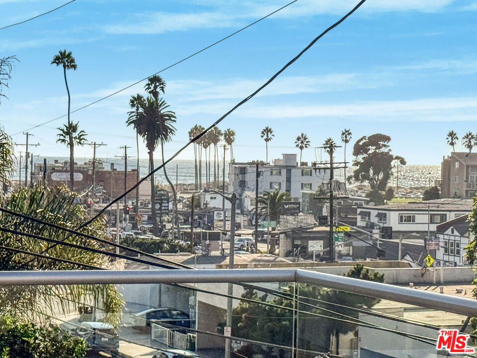 Absolutely stunning ocean view penthouse in Playa del Rey! Spacious 3BR + office/den with breathtaking views of the ocean, main channel, and mountains, and Marina! Dramatic high ceilings and expansive windows fill the home with natural light. Generous floor plan includes a large outdoor sitting area off the living room and two oversized balconies, one off the living room and another off the downstairs bedroom. Massive loft upstairs offers endless potential for office, media room, or additional living space. Well-maintained in original condition and ready for your vision. A rare opportunity to rent an exceptional, one-of-a-kind home by the beach. Must see to appreciate!