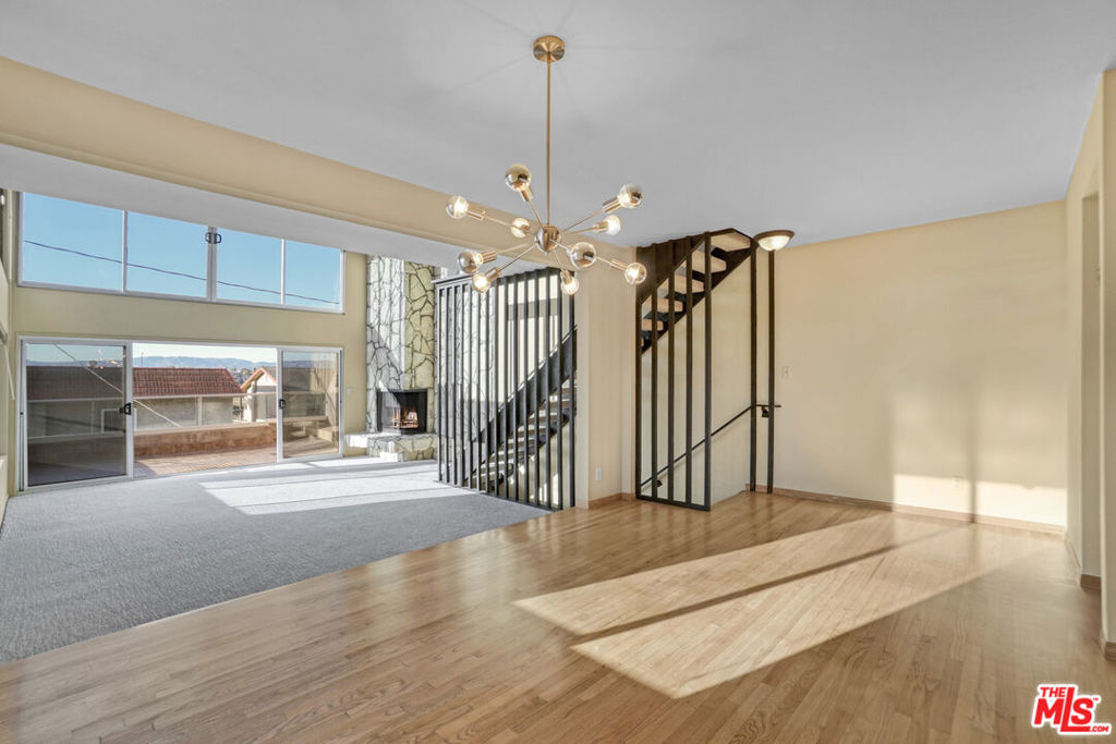 Absolutely stunning ocean view penthouse in Playa del Rey! Spacious 3BR + office/den with breathtaking views of the ocean, main channel, and mountains, and Marina! Dramatic high ceilings and expansive windows fill the home with natural light. Generous floor plan includes a large outdoor sitting area off the living room and two oversized balconies, one off the living room and another off the downstairs bedroom. Massive loft upstairs offers endless potential for office, media room, or additional living space. Well-maintained in original condition and ready for your vision. A rare opportunity to rent an exceptional, one-of-a-kind home by the beach. Must see to appreciate! Very close to the beach and Lagoon Park! New carpets just installed and fresh paint added.