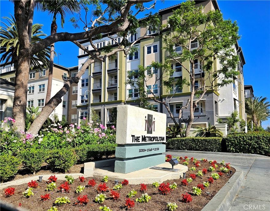 An oasis style living at the guard-gated Metropolitan in Irvine. This is one of the most popular floor plans in the community with the expanded wrap around patio, offering two bedroom suites with full bathrooms, separated by a spacious living, dining area and a den/office area by the foyer. 



The primary suite features dual sinks, a large oval soaking tub, a separate shower, and a walk-in closet. The secondary suite also includes a walk-in closet and a bathroom with a tub/shower combination. There is also a separate office or den.



Tile flooring runs throughout the main living areas, with laminate flooring in the bedrooms. This unit is one of the few with an oversized wraparound patio, perfect for outdoor entertaining.



The Metropolitan offers tropical landscaping, a large pool, spa, clubhouse, and fitness center. Two assigned parking spaces are included in the subterranean garage.  There's also plenty of guest parking on the lower level 2. 



Conveniently located near John Wayne Airport, Newport Beach, Fashion Island and easy access to 405 Freeway.