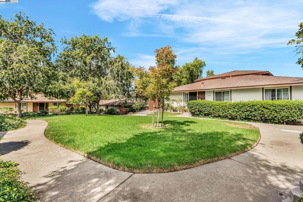 ** OPEN Sat/Sun from 2-4pm** Absolutely STUNNING unit in Mission San Jose's Golden Triangle, just minutes to all 3 schools: Chadbourne Elementary, Hopkins Jr High, and Mission San Jose High! This UPDATED single story townhome is positioned perfectly in the center of the highly sought-after Valle de la Paz community. The END UNIT location draws in more natural light, making this home feel bright, warm, and inviting. Some of the highlights include: Updated kitchen with quartz counters and matching backsplash, shaker-style cabinets, recessed lighting, and stainless steel appliances * Refreshed bathrooms * Laminate wood floors * In-unit laundry * and SO much more. The spacious and private patio is a great place to enjoy a morning coffee or unwind after a long day. The community boasts a club house, heated swimming pool, hot tub, and a well-manicured greenbelt for afternoon walks. Located for convenience and lifestyle, enjoy easy access to Whole Foods, Sprouts, Fremont HUB, plenty of shopping and dining, AND Fremont's TOP RATED schools! Nestled perfectly near 680/880 freeways and Fremont BART make this home a commuters dream. This is not a MUST SEE, this is a MUST HAVE!