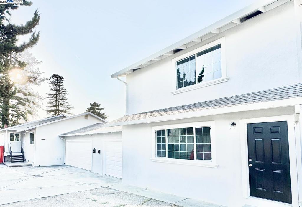 Location, Location, Location! MOVE-IN READY! Potential for ADU Why rent when you can own and rent at the same time—let the second unit help pay your mortgage! This rare duplex feels like two separate single-family homes, making it perfect for owner-occupants or investors. Situated on approximately 1/4 acre at the end of a private flag lot, this large duplex features: Unit 1 (Owner's Unit): 3 bedrooms, 2 bathrooms, 2-car garage Unit 2: 2 bedrooms, 1.5 bathrooms, 1-car garage, Both units have private fenced backyards, Room for 4–6 cars parking in front of the units. Both units have been fully upgraded. Brand new kitchen cabinets and countertops (one unit includes a center island), Heavy-duty stainless steel range hoods. All-new stainless appliances, including ranges and dishwashers. Fresh interior paint throughout both units, New laminate including the stairs. Ideal for families, especially with young children, thanks to the huge private yard and walking distance to a well-rated middle school. Easy access to highways 580, 880, and 660, and you're just minutes from Lake Chabot, BART, downtown, and local shopping centers. This property checks all the boxes: location, condition, flexibility, and investment potential. Don't miss out—move in today and start building equity!
