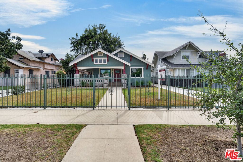 Photo of 1588 W 49th Street, Los Angeles, CA 90062 (MLS # 26103122)