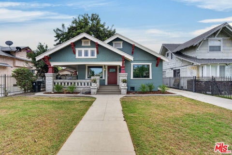 Photo of 1588 W 49th Street, Los Angeles, CA 90062 (MLS # 26103122)