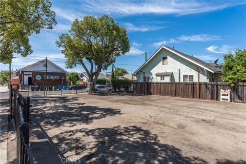 Photo of 951 W 42nd PL, Los Angeles, CA 90037 (MLS # SR26184149)