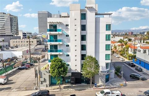 Photo of 637 S Fairfax Avenue #404, Los Angeles, CA 90036 (MLS # OC25249828)
