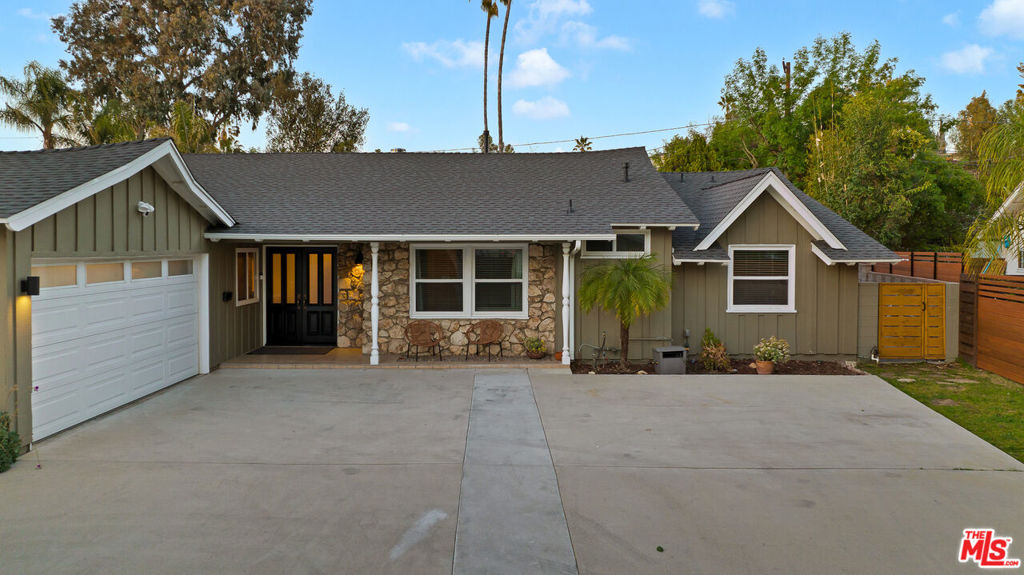 FULLY FURNISHED, FULLY EQIUIPPED!!! This mid-century modern home in Woodland Hills/Calabasas offers comfort, style, and convenience just 25 minutes from Malibu. Featuring vaulted ceilings, skylights, and sliding glass doors, the interior is filled with natural light and contemporary charm. The open-concept living and dining area includes a cozy fireplace and large-screen TV, while the gourmet kitchen is equipped with a Wolf gas range, stainless steel appliances, bar area, and ample storage. With four bedrooms, including a primary suite with king bed, ensuite bath, and walk-in closet, plus a dedicated gym and multiple office nooks, the home is ideal for families or groups. The resort-style backyard boasts a pool, hot tub, fire pit, wood deck, outdoor kitchen/bar, and multiple lounging and dining spacesperfect for entertaining. Located in a quiet, safe neighborhood with a circular driveway, Tesla charger, and plenty of guest parking, the home is just minutes from Calabasas Commons, Westfield Topanga, and offers easy access to downtown LA.