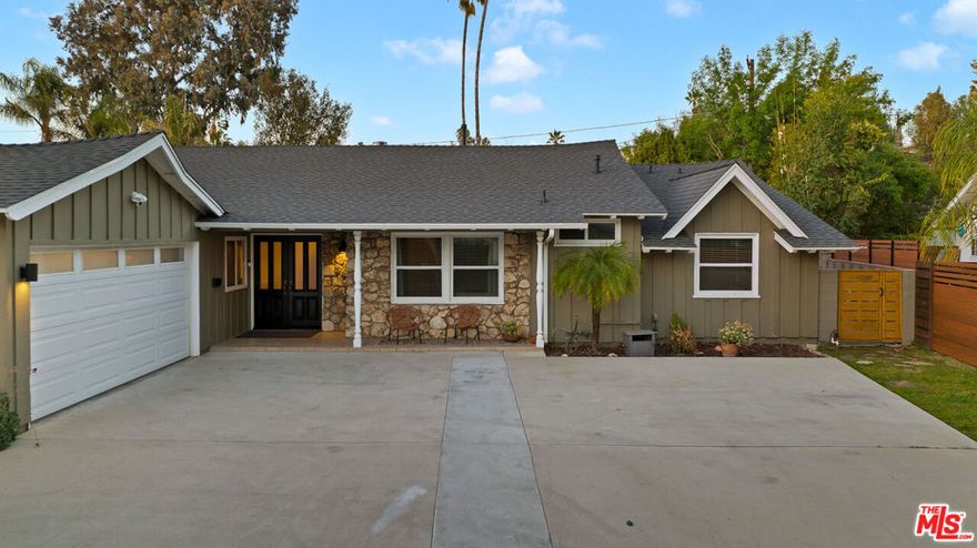 FULLY FURNISHED, FULLY EQIUIPPED!!! This mid-century modern home in Woodland Hills/Calabasas offers comfort, style, and convenience just 25 minutes from Malibu. Featuring vaulted ceilings, skylights, and sliding glass doors, the interior is filled with natural light and contemporary charm. The open-concept living and dining area includes a cozy fireplace and large-screen TV, while the gourmet kitchen is equipped with a Wolf gas range, stainless steel appliances, bar area, and ample storage. With four bedrooms, including a primary suite with king bed, ensuite bath, and walk-in closet, plus a dedicated gym and multiple office nooks, the home is ideal for families or groups. The resort-style backyard boasts a pool, hot tub, fire pit, wood deck, outdoor kitchen/bar, and multiple lounging and dining spacesperfect for entertaining. Located in a quiet, safe neighborhood with a circular driveway, Tesla charger, and plenty of guest parking, the home is just minutes from Calabasas Commons, Westfield Topanga, and offers easy access to downtown LA.