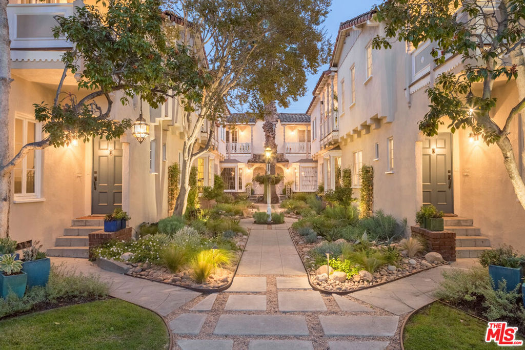 The historic courtyard apartments at El Mirador - circa 1936 - encompass six spacious, two bedroom two-story townhomes that sit on an exceptionally large 1/3 acre of lushly and thoughtfully landscaped land in the heart of Los Feliz Village. This completely renovated residence marries old world artistry and craftsmanship with state-of-the-art technology and design and includes stained-glass windows, old-growth hardwood floors, original travertine-style magnesite stairwell, magnificent tile work, all appliances including dishwasher and washer/dryer, central heat and air, Ring alarm system, high ceilings, formal dining room and garden-view balconies. Each apartment has its own street address and personal garage. El Mirador represents perhaps the most unique, charming and emotional courtyard residence experience in all of Southern California. El Mirador Apartments - Where "Old World" Meets "Today".