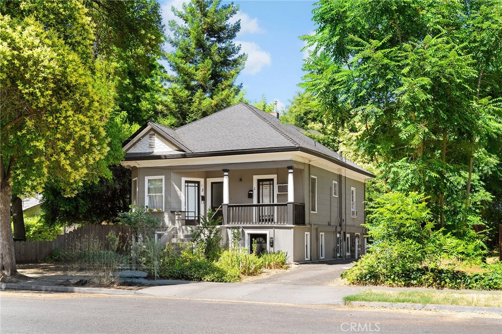 Charming Quadruplex Investment Opportunity in Downtown Chico! This unique and character-filled property offers four 1-bedroom, 1-bathroom units—each with its own distinct charm. Two units are located on the lower level, and two more are upstairs, accessible via a wide staircase that leads to a welcoming porch area perfect for relaxing. Inside the units feature high ceilings, wood-paneled doors, wainscoting, freestanding tubs, and beautifully cased wood windows. The kitchens and living areas are surprisingly spacious, making these units highly desirable. Two of the units have been updated with efficient mini-split systems for modern comfort. Additional highlights include plenty of off-street parking, a detached structure at the back that provides storage space and a laundry setup for Unit #3. Situated near Downtown Chico, Chico State, Enloe Hospital, and Bidwell Park—this is an incredible investment opportunity with prime location appeal!