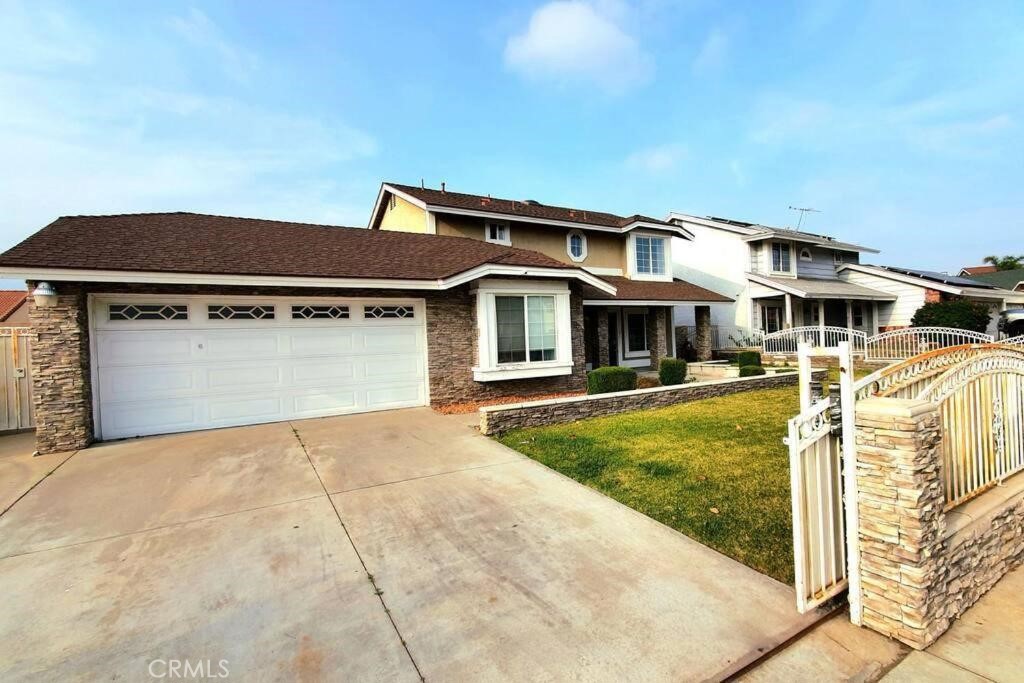 This beautiful newly updated home is very close to shopping, Victoria Gardens, and 15 & 210 freeways * * Nice 4 bedroom home with 3 bathrooms. A cozy family room with fireplace to gather around on cold winter nights. The family room is right off the kitchen. Beautiful kitchen with granite counter tops, kitchen stainless steel appliances (Range, Micro-hood, Dishwasher) * Dining Area off kitchen, Spacious bedrooms, Master Bedroom, Beautiful bathrooms, Nicely tiled and carpet through out, Back yard with plenty of play space, Great Landscaping, beautiful curb appeal.