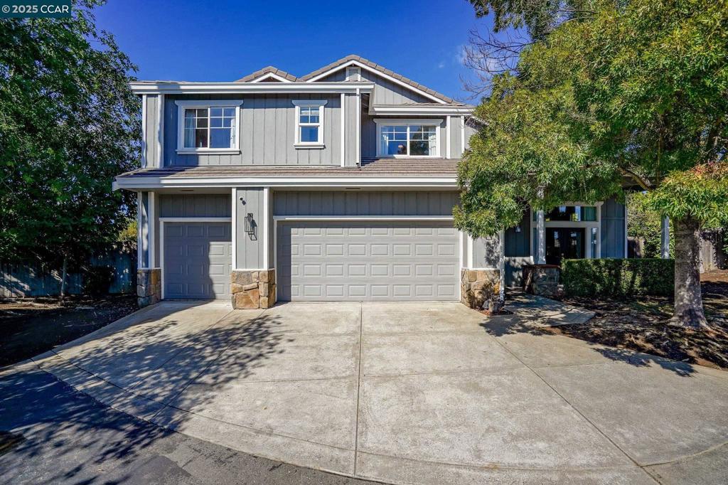 Nestled on a private lane within the highly desirable Canterbury Village community in Concord, this beautifully renovated home sits on a generous 0.29-acre lot, offering both privacy and space. Inside, you'll find a thoughtfully designed interior featuring extensive upgrades throughout. The main living areas boast new flooring, while the bathrooms showcase elegant tile work and the primary suite is enhanced with polished marble finishes. The kitchen, living room, and bathrooms are outfitted with custom cabinetry and quartz countertops, including a farmhouse sink and upgraded toilets. High-end appliances elevate the space, including a Bosch refrigerator and dishwasher, a Café range, and a new hood and microwave. Additional enhancements include a refinished staircase, updated ceiling fans and light fixtures, a refreshed fireplace with a new mantel and tile surround, and a glossy white ceramic tile backsplash. The home’s systems and exterior have also been improved with a brand-new HVAC system installed in 2024 and new turf along the side yard, ensuring year-round comfort and inviting outdoor living. With its modern updates, spacious lot, and serene location, this home is a true gem — one that must be seen to be fully appreciated.