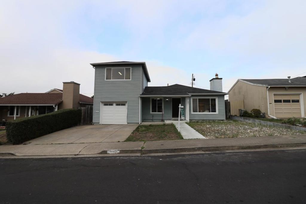 Discover your new home in South San Francisco! This spacious residence offers 1,630 sq ft of living space, featuring 4 bedrooms including a primary bedroom on the ground floor, and 2 full bathrooms with a stall shower in the primary bath. The kitchen is designed for functionality, providing ample room for meal preparation and casual dining. Enjoy the cozy ambiance of the living area with a charming fireplace, perfect for relaxing evenings. Beautiful wood flooring runs throughout the home, adding warmth and elegance. Matterport: https://my.matterport.com/show/?m=FMYq1oExHjW Practical amenities include a window/wall unit for cooling and a wall furnace for heating, ensuring comfort in every season. The home also includes a convenient laundry space. Situated on a lot of 4,500 sq ft, there's plenty of space for outdoor activities. This property is located within the South San Francisco Unified school district. A single-car garage adds to the convenience of this well-rounded home. Make this versatile and inviting home yours today! Don't wait!