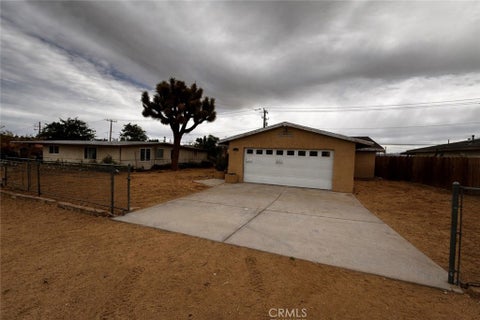Photo of 6317 Indio Avenue, Yucca Valley, CA 92284 (MLS # CV26071253)