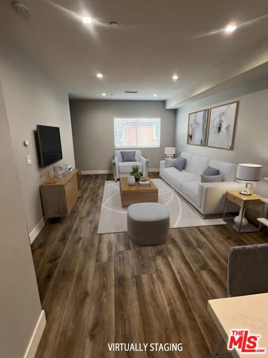 A Sleek, Multi-Level Modern Retreat in the Heart of Van Nuys. Tucked into a quiet, strictly residential enclave of Van Nuys, this multi-level modern townhome redefines urban California living with refined practicality and effortless style. The architecture strikes a clean, contemporary silhouette, offering a private entrance that opens to light-filled interiors and a fluid, spacious layout designed for both comfort and functionality. At the heart of the home lies a true cook's kitchen fully equipped with brand-new, high-performance appliances, abundant storage, and sleek surfaces that make everyday prep and weekend entertaining equally elegant. Gorgeous flooring flows seamlessly throughout, guiding you from generous living areas to elevated private quarters, each bathed in natural light. Thoughtfully designed for today's lifestyle, the residence features Nest thermostats, multi-level climate control, and central air and heat to ensure year-round comfort. Dedicated space and hookups for a washer and dryer add everyday convenience, while two private parking spaces complete with an electric vehicle charging station underscore a commitment to modern living. With quick access to major freeways, the location blends suburban tranquility with city connectivity, making it an ideal sanctuary for those who crave style, space, and ease all within reach of the best of Los Angeles. Tandem parking uncovered in a secure lot behind the building. All utilities paid by the tenant.