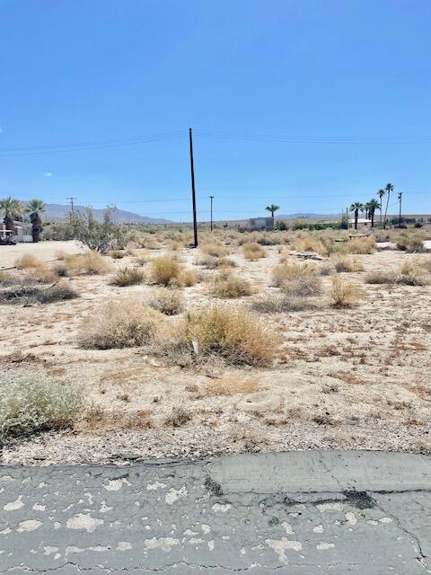 Great opportunity to own this vacant lot! Located in the private community of Desert Beach Estates in North Shore. It's ready for a new owner to be creative and build a Custom home! It offers beautiful Lake views.