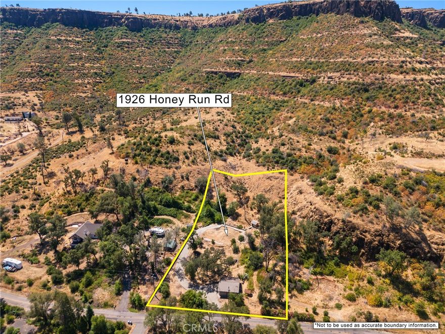 Fantastic opportunity to build in the heart of Butte Creek Canyon! Sitting on 1.44 acres along scenic Honey Run Road, this property comes with a spacious shop/garage already equipped with power. Several valuable features remain intact from before the Camp Fire, including the concrete driveway, septic system, Earl Jones well and well house, the shop, plus a variety of established trees and plants. The prior residence was a 3-bedroom, 2-bathroom home with 1,708 sq. ft. The septic system was inspected after the fire and deemed functional, and while the well house no longer has direct power, it was successfully tested with a generator, producing plenty of water.

The shop measures approximately 28’ x 28’, offering a two-car garage, tall ceilings, lights, power, and a durable metal roof—making it easy to convert into an ADU or guest house. Whether you envision extra space for family, a private retreat for guests, or the opportunity to generate rental income, this addition can enhance the property’s value while you build your dream home. Other charming elements include a rock-lined dry creek and a quaint footbridge leading to the well house. With its existing infrastructure and natural beauty, this property is ready for your vision to bring it back to life!