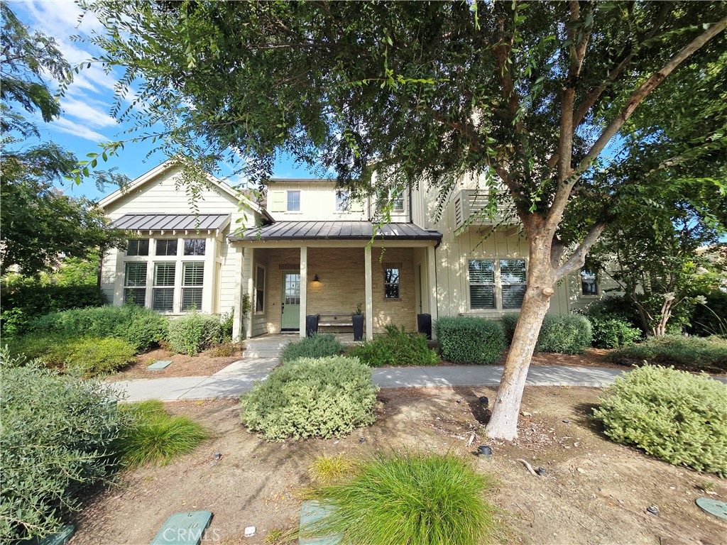 Discover the award-winning, fully upgraded model home at the heart of Beacon Park in Great Park. This contemporary residence spans nearly 3,000 sq. ft. on a 7,000-sq. ft. lot and features 4 bedrooms and 4½ bathrooms within an open-concept layout. Step into the expansive living room perfect for movie nights or entertaining with built-in ceiling Bluetooth surround sound. The gourmet kitchen showcases an oversized island, extensive counter space, custom cabinetry, a large pantry, and stainless-steel appliances to satisfy every culinary ambition. Rich hardwood flooring flows throughout the downstairs, leading you to a cozy backyard oasis complete with a BBQ bar and patio seating. For added flexibility, a private downstairs suite offers its own living area, full bathroom, and separate entrance ideal for guests or a home office. Upstairs, the luxurious master suite invites you to unwind with a generous walk-in closet, while a spacious laundry room enhances daily convenience and overall home value. Sunlight pours in through abundant windows, illuminating the home and framing picturesque neighborhood views. Don’t miss your chance to call this dream home in Irvine’s Great Park your own!
