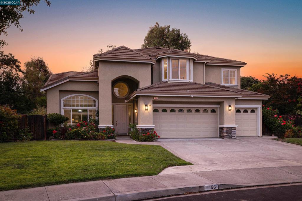 Ideally located at the end of a cul-de-sac, this 5-bedroom, 3-bathroom home offers space, style, and everyday ease. Immediately upon entering, you’re greeted by soaring ceilings and abundant natural light that give the home an open, airy feel. The layout includes both formal living and dining areas, along with an updated kitchen and great room that flow seamlessly out to the backyard—perfect for indoor-outdoor living. Quartz countertops and thoughtful design make the kitchen both functional and stylish. Step outside to a flat, beautifully landscaped yard designed for entertaining. A heated pool and spa take center stage, surrounded by fresh green grass, fruit trees, blooming roses, and low-maintenance landscaping throughout—an ideal setting for relaxing or hosting year-round. The private primary suite is a true retreat, featuring its own fireplace, walk-in closet, and a beautifully renovated bathroom. A full bedroom and bathroom on the main level add even more versatility—ideal for guests, or a home office. The oversized three-car garage provides generous space for a home gym, workshop, or storage. The location offers easy access to BART via a nearby path and is just minutes from shopping, dining, and freeway. The home is also within a district known for its top-rated schools.