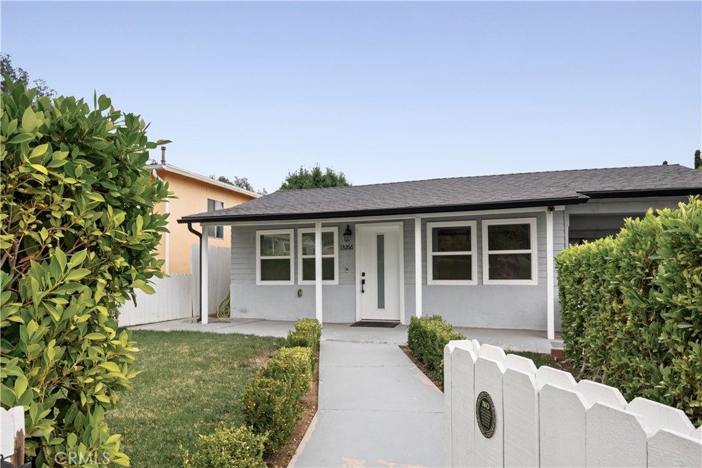 Welcome to this tastefully renovated single-story home located in one of Sylmar’s most private and desirable areas. This 3-bedroom 3-bathroom home is nestled in the hills of Sylmar, adjacent to the famous Veterans’ Park & hiking trails. Completely beautifully renovated just over 2 years ago with no expense spared, including a new HVAC system, new plumbing, new Electrical, and a brand-new roof. The approximately 1.200 sq ft of the living area comes equipped with a brand-new custom kitchen with under-cabinet lighting and stainless-steel appliances, all part of and included in the sales price of the home. Bathrooms with Carrera vanities, lighted mirrors, and designer tiles. Large principal bedroom with direct access to the massive backyard, walk-in closet, and custom finishes in the private principal bathroom. All flooring updated throughout the home, with a newer washer and dryer, windows, a plug & Play surround sound system, rain gutters with a gathering water barrel system around the home. The backyard is made private by wood privacy fencing all around. Property includes plans for the future owner to build a brand new 3 Bedroom 2-bathroom 1,200 sq. ft. ADU (previously approved but expired permits).