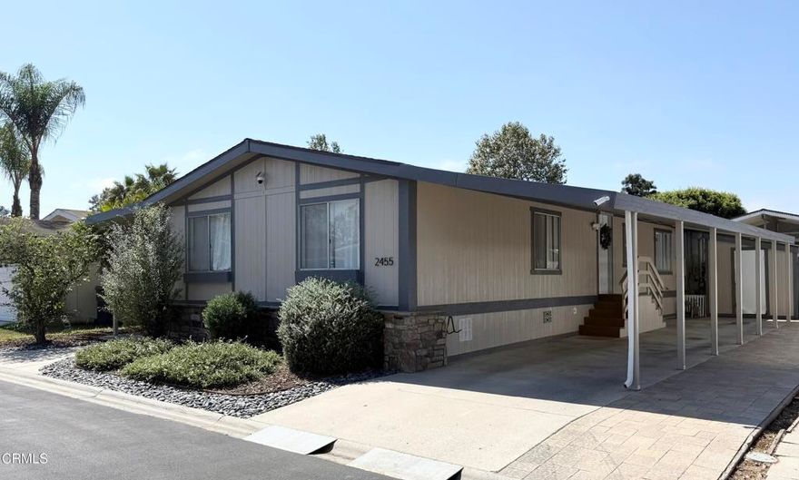 Welcome home to this beautifully remodeled 2-bedroom, 2-bath manufactured home located in the desirable Meadowlake Park community in North Oxnard! This charming residence is completely upgraded and offers a perfect blend of comfort, style, and modern efficiency. Step inside to an open-concept kitchen featuring quartz countertops, a kitchen island, stylish cabinetry, and plenty of space for entertaining. The cozy living area includes a built-in fireplace, perfect for relaxing evenings, and 2 spacious bedrooms that feature custom-designed closet systems with built-in drawers and hanging space. This home has been thoughtfully upgraded with luxury vinyl flooring, new drywall, a new furnace, solar panels, and a tankless water heater with a full-home filtration system.Enjoy peace of mind with a roof that's only 4 years old, a freshly painted exterior, AC system, heater, and recently upgraded front doorsteps and stone accents around the home. Outside, you'll find a rare large backyard with a pergola and a newly built brick garden--ideal for outdoor gatherings. Pavers line the side of the parking area for added curb appeal and functionality.Meadowlake Family Park features 3 Lakes, a community pool, spa and a clubhouse. The park is also conveniently located near freeway access, and Oxnard's The Collection and Esplanade Shopping Centers that have some of the area's best restaurants, shopping and entertainment! With energy-efficient features, a spacious layout, and tasteful updates throughout, this home is truly move-in ready. Don't miss your chance to own this unique property with both comfort and character!