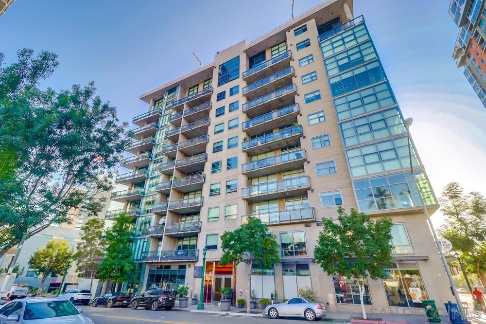 Located in the beautiful cement and steel constructed Aperture building in Little Italy, this spacious 2 bed/2 bath condominium is move-in ready. This 5th floor unit features designer finishes throughout with a private balcony overlooking the city lights and San Diego Bay. This single-level, west-facing floor plan is perfect for working from home and is conveniently located down the hall from the elevator, providing easy access to all the perks urban Little Italy living has to offer all in a private, secure, and luxurious setting. Unit amenities include stainless steel appliances, modern cabinetry in kitchen and bathrooms, beautiful Brazilian wood flooring, washer/dryer, granite counters, central air conditioning and heating with Nest thermostat, 11' concrete ceilings, remote controlled window coverings, extra storage and ample closet space. The en suite bath features tub/shower combination and connects to an oversized walk-in closet. The second bedroom converts easily to an office and back again via a modern Murphy Bed. The kitchen and living area are connected by sit down bar providing an open concept feel ideal for entertaining. Two assigned parking spaces in subterranean parking garage just steps to the elevator with an additional walk-in, secured storage unit. Aperture lies on the south side of Little Italy, just steps to either the heart of Little Italy or Downtown San Diego providing a multitude of high-end restaurant, boutique, art and entertainment options, including San Diego's top-rated Farmers' Market every Saturday.