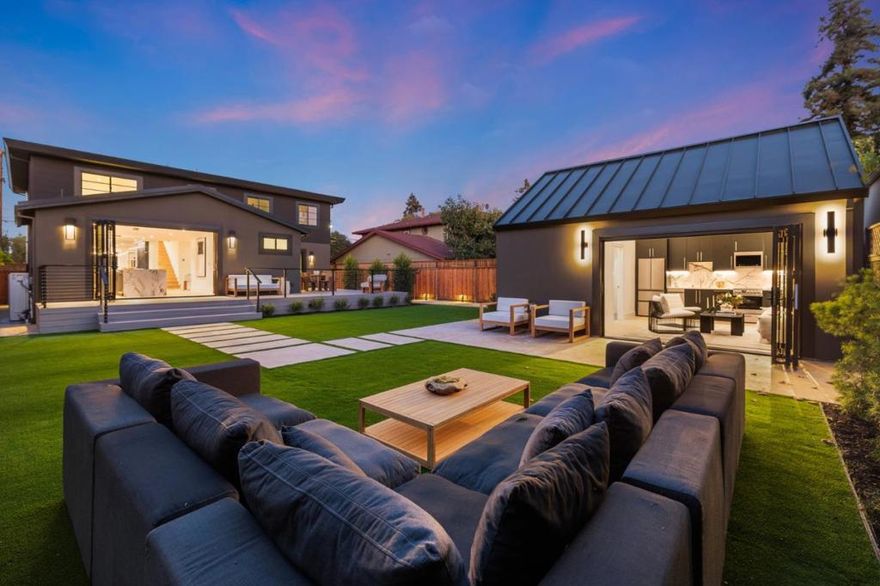 Transcending the boundaries of luxury, the acclaimed Simon Offermann Group elevates architecture into artistry through intentional design, artisanal craftsmanship, and uncompromising detail, unveiling a strikingly re-envisioned 4BR/4BA 2,580 SF residence with a private 1BR/1BA 363 SF guest studio that delivers a truly immersive modern living experience. Sparing no expense, every surface embodies a masterful curation of the worlds finest materials. Grand-scale signature spaces flow across a luminous floor plan, enhanced by lofted ceilings, expansive windows, skylights, and dramatic walls of glass that magnify volume and unite the interiors with the outdoors. Composed as a statement of form and function, the European-inspired kitchens and baths showcase Italian porcelain slab counters, bespoke cabinetry, and Porcelanosa tile from Spain, complemented by premium German appliances and fixtures. Poetically extending the living space, a wraparound deck reveals a sprawling, meticulously landscaped retreat that culminates in a guest studio with a unique address, cathedral ceilings, kitchen, bath, and walk-in closet. Enhancements extend to an attached 2-car garage, indoor laundry, custom Ultra wine storage, all-new electrical, plumbing, HVAC, windows, and an array of elite accoutrements.