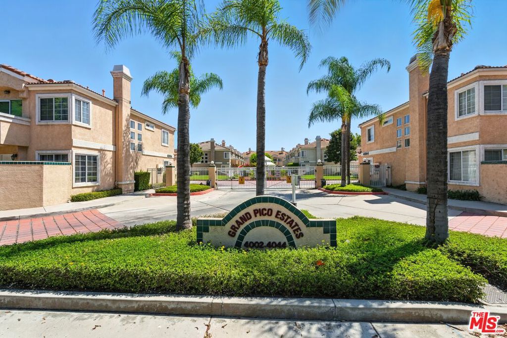Welcome to Grand Pico Estates, a wonderful family community in the heart of Pico Rivera! This inviting two-story home offers 3 bedrooms and 3 bathrooms in a secure, private gated setting perfect for peace of mind. You'll appreciate the attached two-car garage plus plenty of guest parking for friends and family. The community features a g pool, relaxing spa, and BBQ area, giving you great options for year-round fun and gatherings. Inside, enjoy an open-concept layout with a fireplace, a dining area that flows into a private patio for outdoor play or entertaining. Upstairs, the owner's suite offers a comfortable retreat, featuring a walk-in closet, dual sinks, a full bathroom, and a private balcony. If you're looking for a safe, friendly, and well-maintained community to call home, this is the perfect place for your family.