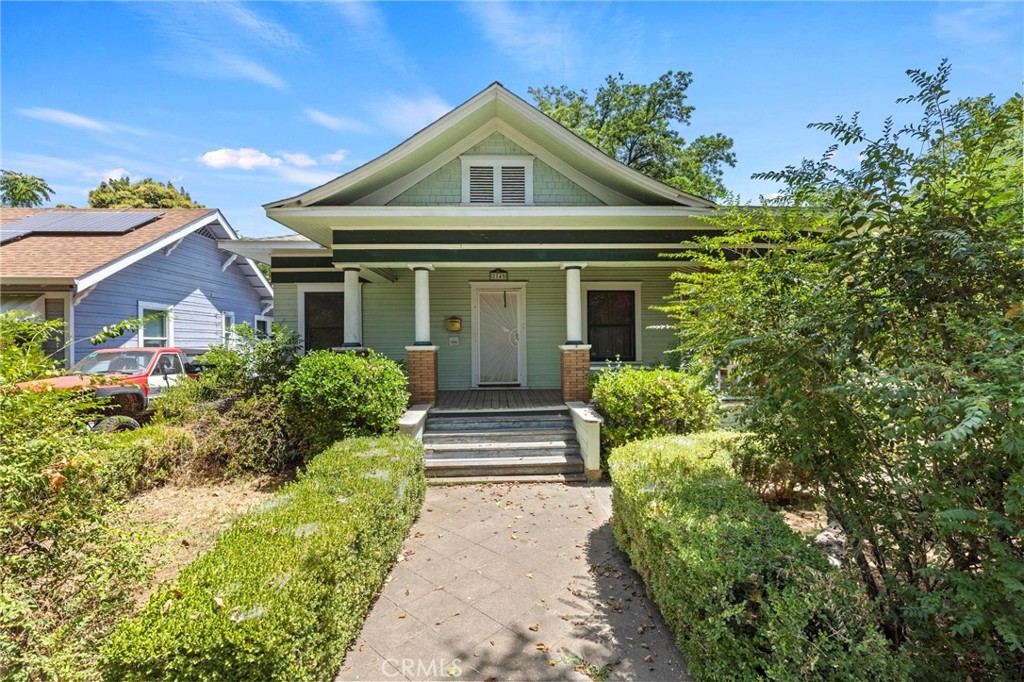 Charming Victorian Duplex with Income Potential! This unique residential income property offers two separate living units, perfect for owner-occupancy with supplemental rental income, multi-generational living, or investment. The main house, a beautifully preserved single-story Victorian, spans approximately 1,300 sq. ft. and features 2 bedrooms and 1 full bath, previously rented for $1,100/month. Built in 1910, it boasts timeless character with original wood floors, stained glass windows, high ceilings, and custom built-in cabinets and storage throughout. The spacious layout includes a cozy fireplace, large closets, and a charming wrap-around covered porch, perfect for enjoying the neighborhood atmosphere. The kitchen features a central island, and the home also offers a utility/laundry room, cellar, on-demand water heater, and forced heat and air for year-round comfort. The second unit is a private, self-contained space of approximately 500 sq. ft., including a living room, kitchen, bedroom, and bathroom. Previously rented for $675/month, it's an excellent opportunity for steady rental income or flexible guest accommodations. Outside, the property offers excellent amenities: a detached garage with a shop area, greenhouse, additional storage building, fenced backyard, alley access, and a patio area ideal for outdoor gatherings and gardening. Located close to bike trails, community parks, lakes and rivers, and just minutes from shopping, dining, and year-round outdoor recreation, this property offers both charm and convenience. Whether you're looking to invest or live with the benefit of passive income, this rare duplex is full of character, space, and opportunity. Don't miss out on this versatile and income-generating gem!