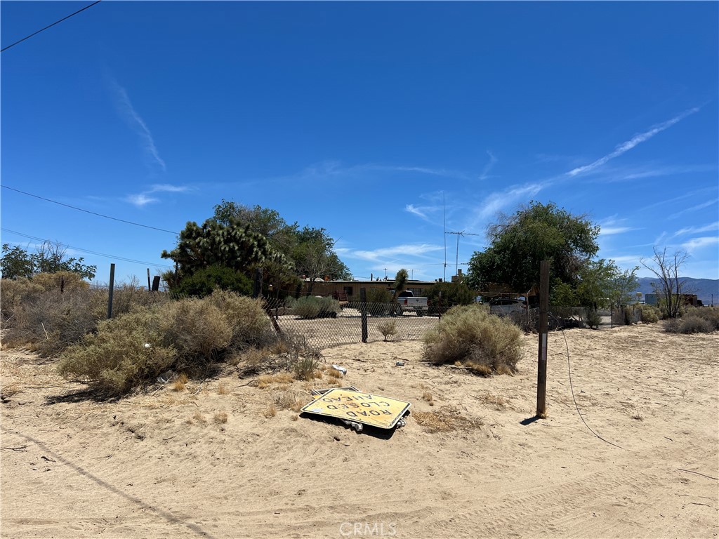 Desert Homestead Retreat on 10 Acres with Expansive Views
Welcome to your desert sanctuary—set on a fully fenced 5-acre parcel with two additional 2.5-acre lots, offering room to expand, invest, or simply enjoy wide open space. This homestead has been thoughtfully enhanced with a 2-car garage, breezeway service porch, and an enclosed patio, providing both function and comfort in a tranquil setting.
A detached barn with mezzanine adds valuable storage and workspace, with potential for an office, art studio, or creative hub. One of the adjoining 2.5-acre parcels even includes a charming “caddy shack”—ideal for guests, recreation, or future use.
Your private well ensures ample water for gardens, trees, or small-scale homesteading. Step outside to stunning San Gabriel Mountain views from the rear of the property, and soak in breathtaking desert sunsets each evening.
This property invites you to embrace your artistic talents, reconnect with nature, and find peace to gather your thoughts—a perfect setting for a writer’s retreat, a creative getaway, or simply a slower, more inspired lifestyle.