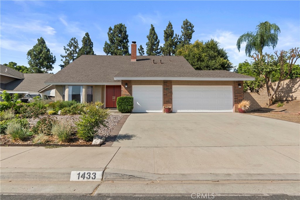 First time on the market in 25 years, this home offers a rare opportunity to reimagine a property with solid fundamentals and excellent potential. Nestled on a cul-de-sac with mountain views, the lot of just over 10,000 sq. ft. provides space, privacy, and versatility. Outdoor highlights include a newly redone pool and spa with adjacent lawn, multiple mature fruit trees (guava, pomegranate, fig, lemon, and mango), a garden-ready area, a patio for gatherings, and a separate fire pit space for evening enjoyment.
Inside, the home features a versatile layout with a main-floor bedroom and remodeled bathroom. An adjacent enclosed patio provides potential for expanded living space or possible ADU conversion (buyer to verify with city), while preserving a generous backyard. Upstairs, the primary suite enjoys vaulted ceilings, and two additional bedrooms share a Jack-and-Jill bathroom. A three-car garage with a drive-through bay, plus driveway parking for three more vehicles, enhances adaptability for storage, workspace, or future living needs. Additional highlights include refreshed landscaping with drip irrigation, pex plumbing, and a decorative brick fireplace. Being sold in as-is condition, this property invites its next owner to customize and unlock its full potential.