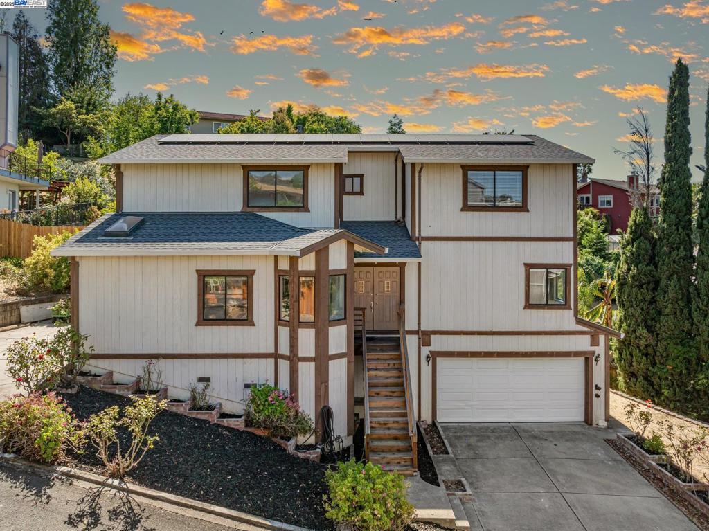 Seize the opportunity to personalize this 5-bed, 3-bath home on a tranquil Vallejo court! With nearly 3,000 sq. ft. on a large lot, this property is a blank canvas for your dreams. The main level features a living room w/vaulted ceilings, formal dining w/access to outdoor patio, a family room w/a fireplace & step out deck to enjoy the VIEWS. A highly desirable full bedroom & bathroom on this floor offers flexibility for guests room, office or gym. The large kitchen provides abundant cabinet space & awaits your custom finishes. Upstairs, the primary suite is a true retreat w/a walk-in closet, soaking tub & walk in shower. Three additional bedrooms & another full bath provide ample space for all. The generous lot includes a patio & large deck, perfect for entertaining. A 2-car garage plus a long side driveway offers additional parking & potential RV/boat parking. Home equipped w/owned electric solar system. Enjoy privacy while being moments from Hanns Park for hiking, freeway access, shopping plaza, restaurants, Costco, Kaiser, Blue Rock Springs Golf Course & Six Flags. Don't miss this chance to acquire a fantastic home and infuse it with your unique style!