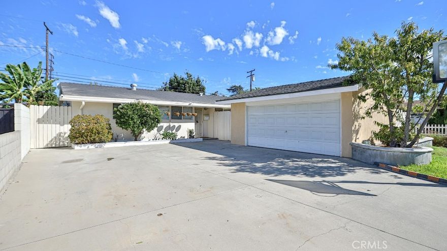 Welcome to 1630 N FERNDALE ANAHEIM. Looking at the house, you will see a beautiful front yard with plenty parking concrete , this highly UPGRADED single level property has 4 beautiful remodel bedrooms and 2 remodeled bathrooms, perfect size 1307 sf and sits on NICE 6447 LOT SIZE, desirable neighborhood this stunning.The house has remodeled home offers the perfect blend of modern and functional design. Enjoy the convenience of an attached 2-car garage —a rare find in this neighborhood. Step in the house TURN KEY CONDITION, waterproof vinyl flooring throughout, crown molding, recessed lighting.This is a stunningly upgraded home and has custom upgrades through out. Another new remodeled bathroom and inviting master bedroom is remodeled, this home offers an open-concept design filled with natural light, creating an inviting and airy feel. The living room, dining room, and family room are seamlessly connected, creating a perfect indoor-outdoor flow for hosting guests. The heart of the house is THE KITCHEN HAS BEEN BEAUTIFUL UPGRADED with Island countertops, SLEEKS CABINETS and add a beautiful ceiling light, BRAND NEW Tankless water heater.The spacious family and dining areas flow seamlessly, while large French door windows provide serene views of the lush backyard. From the dinning room opens to the back yard through sliding making this home ideal for gatherings. The backyard is a haven of relaxation, with ample space for outdoor activities, a well-maintained patio, and beautiful landscaping that ensures privacy and tranquility, you can enjoy the sight of lush green trees, creating a serene and vibrant atmosphere.The open patio offers the perfect space for relaxation or entertaining guests amidst nature’s bounty. Additionally, it is just moments away from a shopping mall, supermarkets, and other essential amenities, making it an ideal choice for both comfort and Conveniently located near the  Freeways, shopping malls, supermarkets, and restaurants, this property is a PRIME OPPORTUNITY in a highly sought-after location. PLEASE SCHEDULE TO VIEW THE HOUSE TODAY!