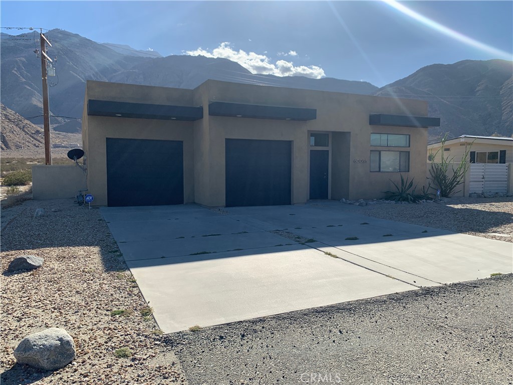 Escape to the sun-drenched allure of Palm Springs in this beautifully appointed 3-bedroom, 2.5-bath single-family home at 60055 Overture Dr, nestled in the serene Palm Springs Oasis neighborhood. Built in 2006, this 1,703 sq ft gem offers contemporary comfort on a spacious 0.17-acre lot, blending effortless indoor-outdoor living with the desert's iconic mid-century vibe. Perfect for families, just minutes from the vibrant energy of downtown Palm Springs.
Step inside to an open-concept layout bathed in natural light, featuring sleek modern finishes, a cozy fireplace for those rare cool evenings, and central heating to keep you comfortable year-round. The kitchen has ample cabinetry, flowing seamlessly into a generous living and dining area ideal for entertaining. Three well-sized bedrooms, private yard oasis awaits with low-maintenance landscaping, a covered patio for al fresco dining, and plenty of space for lounging under the stars.
Conveniently located off N. Palm Canyon Dr, you're moments from the I-10 freeway for easy access to Joshua Tree National Park, world-class golf courses, hiking trails, and the eclectic shops and eateries of Uptown Design District. Within the acclaimed Palm Springs Unified School District, this R1-zoned residence combines suburban tranquility with urban excitement. Pets welcome with approval.