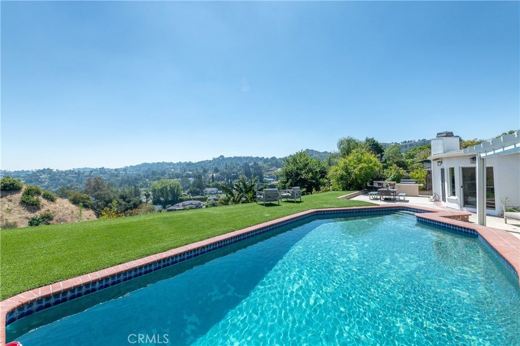 Photo of 3666 Sapphire Drive, Encino, CA 91436 (MLS # SR26112183)